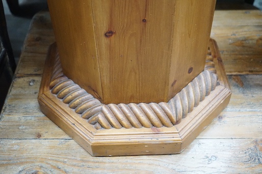 An octagonal pine pedestal, width 50cm, height 75cm